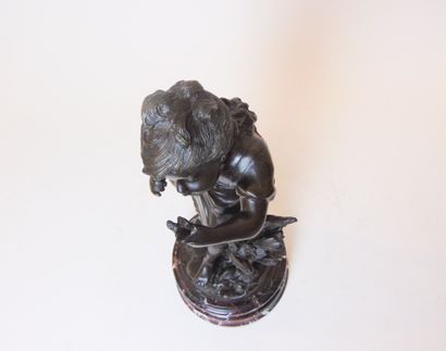 MOREAU Auguste (1834-1917) "Fillette à l'oiseau", early 20th century, patinated bronze...