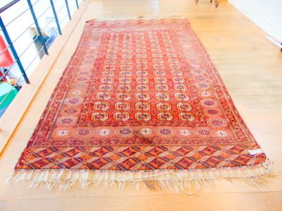 null Large Turkmen carpet in the Bukhara style with göls, 432x229 cm approx. Wear...