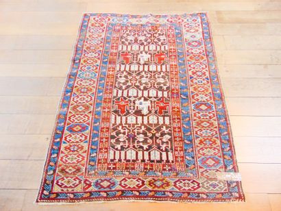 null Small Caucasian carpet in the Kazak style with polychrome geometric motifs on...