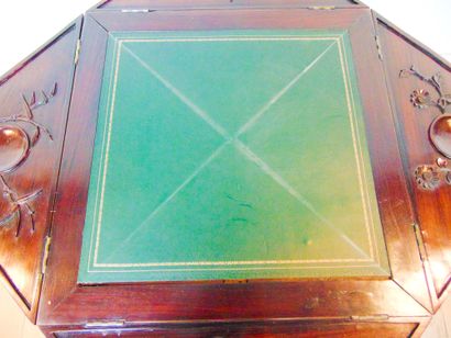 null A handkerchief-shaped games table opening with four drawers in the waist, Anglo-Chinese...
