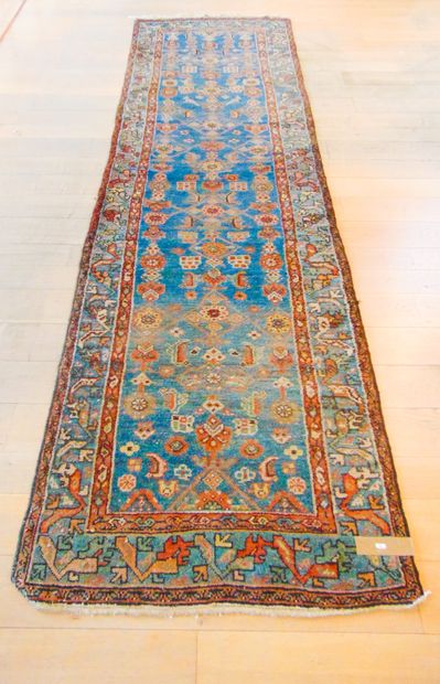 null A Persian gallery carpet in the Nahavand style with polychrome geometric motifs...