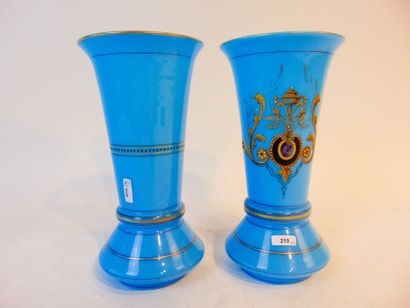 null A pair of 19th-century opaline glass vases with swollen base and flared neck,...