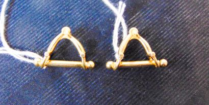 null Pair of stirrup cufflinks in yellow gold (18 carats), traces of hallmarks, l....