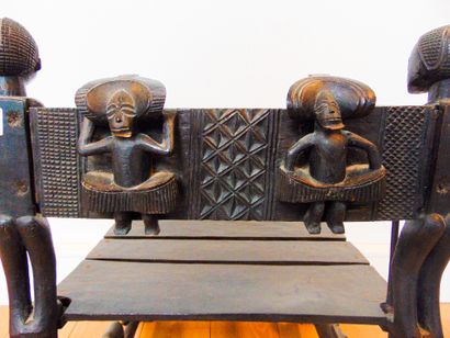 ART TRIBAL A seat with a rich historiated decoration of figures in the round, 20th...