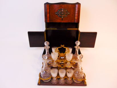 null A Napoleon III period liquor cabinet, late 19th century, veneered with burgundy...