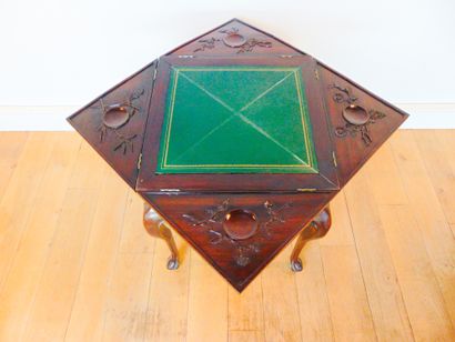 null A handkerchief-shaped games table opening with four drawers in the waist, Anglo-Chinese...