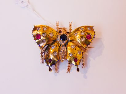 null Butterfly brooch in yellow gold (18 carats) with enamel and set with a sapphire...