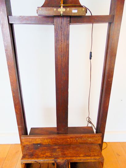 null A large workshop easel with crank handle and two drawers, late 19th century,...