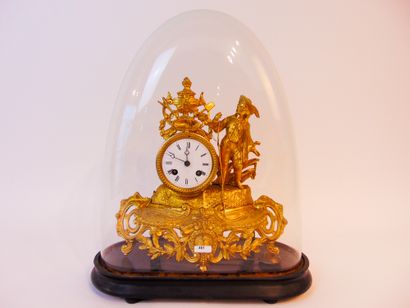 null A Napoleon III period mantel clock with a figure in the round, late 19th century,...