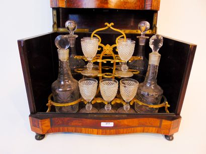 null A Napoleon III period liquor cabinet, late 19th century, veneered with burgundy...