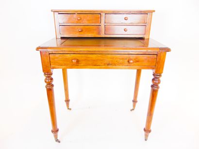 null Louis-Philippe style lady's desk with five drawers, legs with casters, 19th...