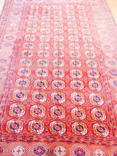 null Large Turkmen carpet in the Bukhara style with göls, 432x229 cm approx. Wear...