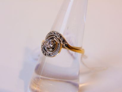 null Yellow gold ring (18 carats) set with a diamond and gems in a swirl, size 54,...