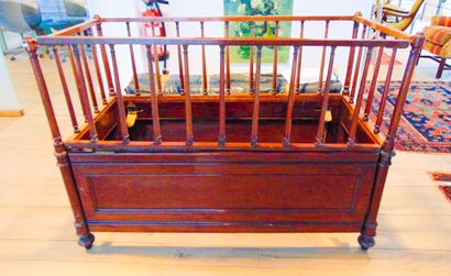 null A Louis-Philippe period child's bed, circa 1840, wood and mahogany veneer, 102x143,5x71,5...