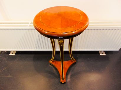 null A tripod pedestal table in the Louis XVI style, 20th century, stained wood with...