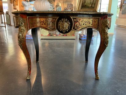 null A Napoleon III period middle table opening with a drawer in the waist, late...