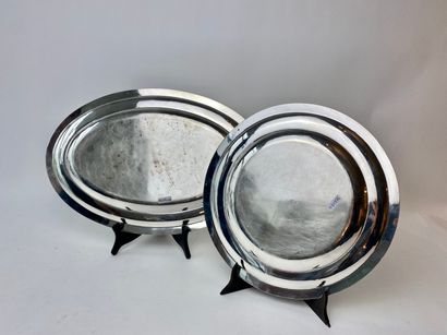 France Pair of Louis XVI style dishes (round and oval), 1973-, chased silver with...