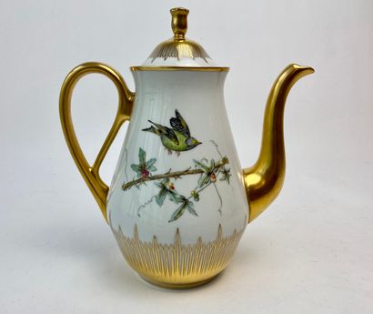 DESCAMPS - BRUXELLES A piriform teapot with polychrome decoration of branching birds...