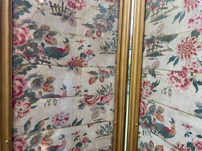 null A Louis XV style two-leaf folding screen forming a photograph holder, circa...