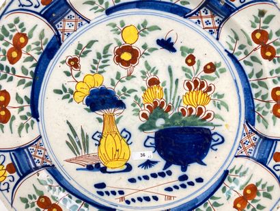 DELFT A pair of deep dishes with polychrome Far Eastern decoration, 18th century,...