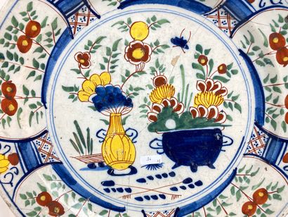DELFT A pair of deep dishes with polychrome Far Eastern decoration, 18th century,...
