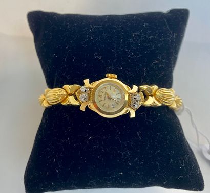 ZENITH Montre-bracelet de dame en or jaune (18 carats) sertie de quatre brillants,...