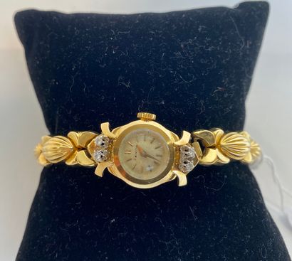 ZENITH Montre-bracelet de dame en or jaune (18 carats) sertie de quatre brillants,...