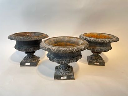 null Suite of three crater vases, 20th century, cast iron, h. 18 cm [used condit...