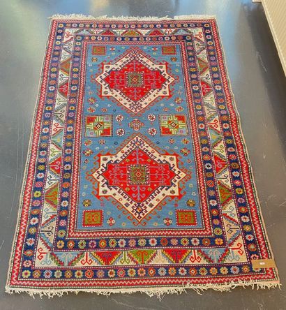 Caucasian carpet with double medallion and...