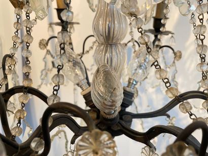 null Chandelier-cage with six arms and nine lights decorated with tassels and garlands,...