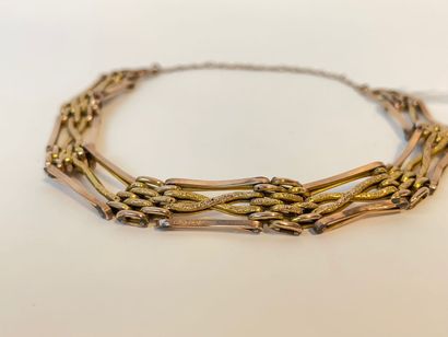 null Fancy gilt metal mesh bracelet [slight alterations and restorations].
