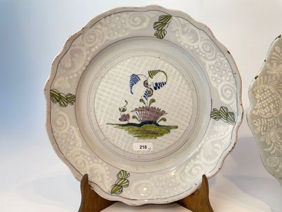 SAINT-AMAND [attribué à] Three scalloped plates (one pair) with polychrome decorations...