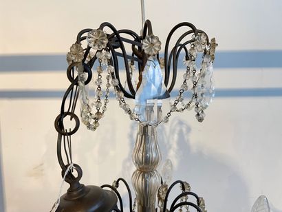 null Chandelier-cage with six arms and nine lights decorated with tassels and garlands,...