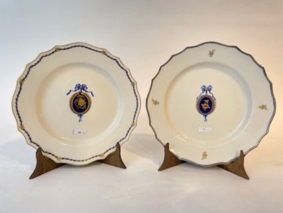 TOURNAI Two curved plates with neoclassical medallion decoration in blue and gold,...