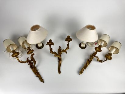 null Three Louis XV style two-light arms, one pair, 20th century, bronze, h. 39 cm...
