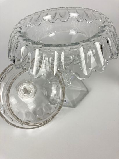 null Candy jar and cup on foot, 19th century, blown and cut crystal, h. 29 cm and...