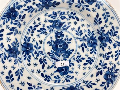 DELFT Pair of plates with floral decoration in blue monochrome, 18th century, stanniferous...
