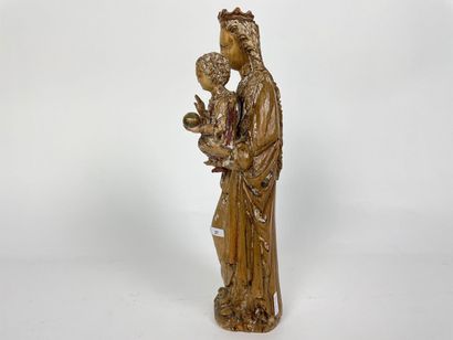 FLANDRES "Virgin and Child", circa 1500, carved wooden statuette with traces of polychromy,...