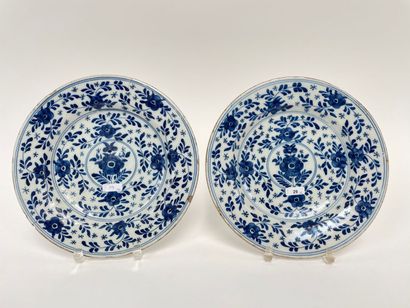 DELFT Pair of plates with floral decoration in blue monochrome, 18th century, stanniferous...