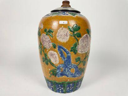 CHINE Pair of jars with polychrome enamel decoration on cookie of flowers in light...