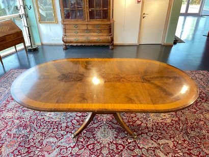null English round table with four-legged base on casters, 20th century, veneer,...