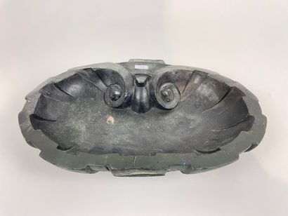 null Conch-shaped stoup, probably 19th century, carved stone, l. 37,5 cm [chips and...