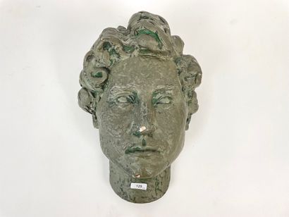 null "Faces of Women," mid-20th century, a grouping of four terracotta and/or plaster...