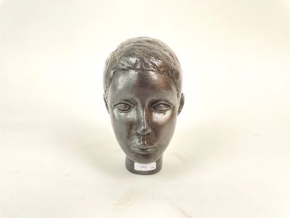 ANONYME "Woman's Bust" and "Boy's Head," mid-20th century, two sculptures in patinated...