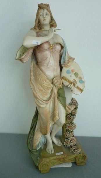 VIENNE Statue en porcelaine représentant "Une Artiste Peintre", décor polychrome,...