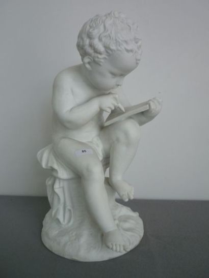 null Statue en biscuit représentant un "Amour sur rocher écrivant", ht 33 cm.