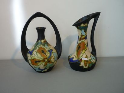 BELGIQUE - C.B. ÄREN-PLATEEL Deux vases ansés à décor floral stylisé d'émaux polychromes,...