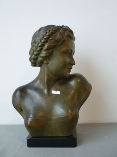 ECOLE FRANCAISE "Jeune femme", circa 1930, buste en plâtre patiné façon bronze, signé...