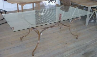 null Table rectangulaire formée d'un entablement en verre épais et d'un socle en...