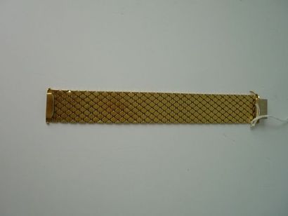 null Bracelet rigide en or jaune et blanc, +/- 79 g.